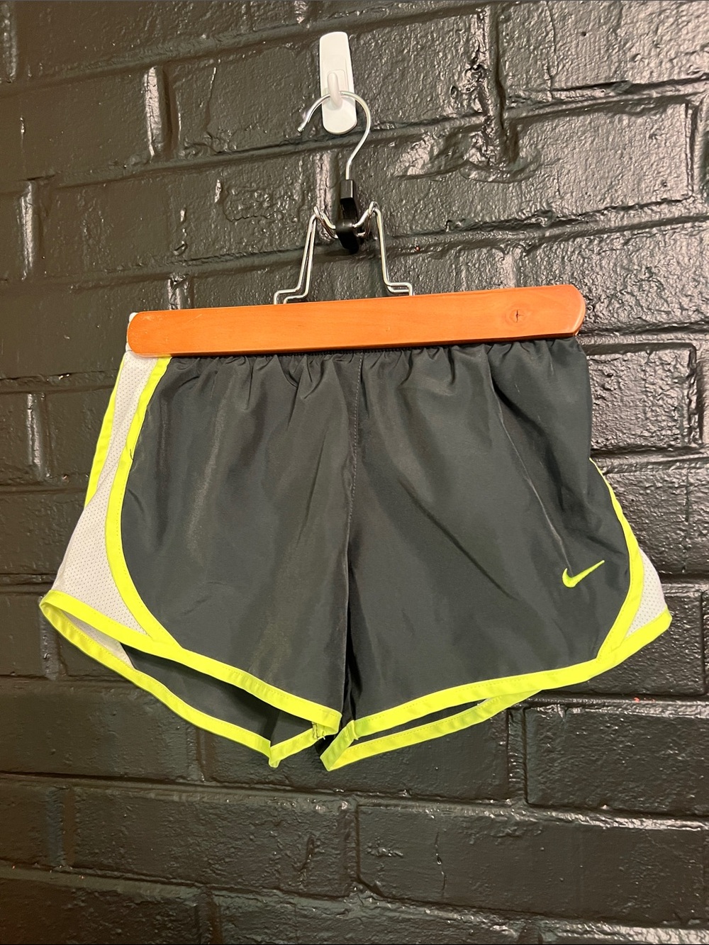 Nike girls charcoal Running Shorts with Neon Yellow Trim